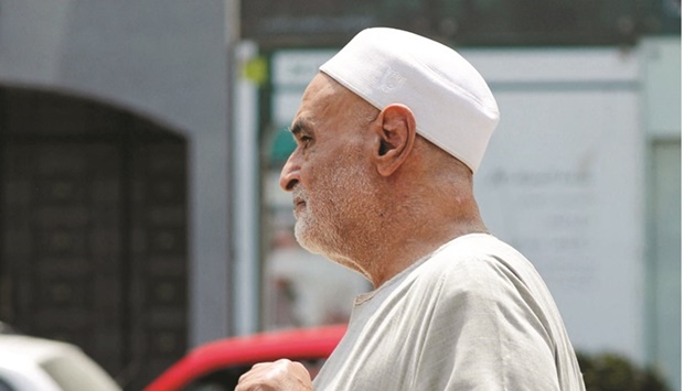 A man walks past a branch of the EFG Hermes investment bank in Cairo (file). Earlier this year, First Abu Dhabi Bank offered to buy a majority stake in EFG Hermes, valuing the firm at $1.2bn, in whatu2019s likely to be the biggest acquisition yet in Egypt by the UAEu2019s largest lender.