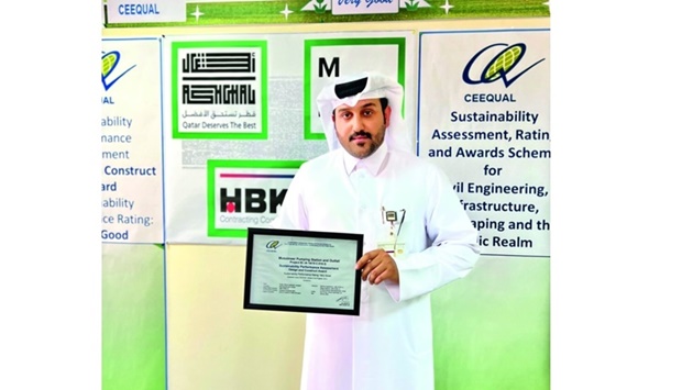 Ashghal's engineer Saad al-Marri with the CEEQUAL certificate.