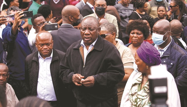 President Cyril Ramaphosa meets with people who lost family members during flooding in Clermont, Durban, yesterday.