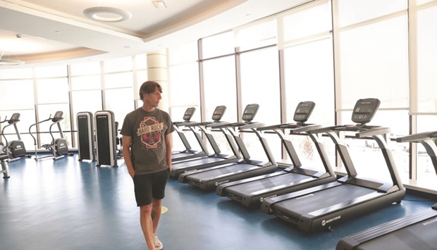 An Argentine team official inspects the gymnasium at the Qatar University campus earlier this month.