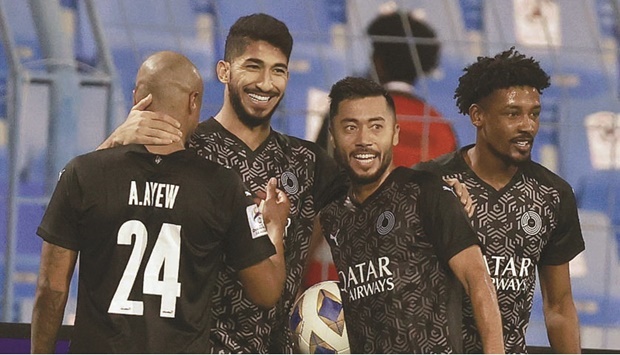 Al Sadd players celebrate after their win over Al Wehdat in Group E match of the AFC Champions League in Dammam on Friday.