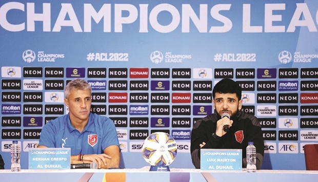 Al Duhail coach Hernan Crespo and player Luiz Martin are seen during a press conference in Buraidah, Saudi Arabia, on Sunday.