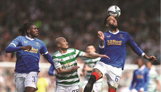 Rangersu2019 Connor Goldson in action with Celticu2019s Daizen Maeda during their Scottish Cup semi-final at Hampden Park in Glasgow yesterday. (Reuters)