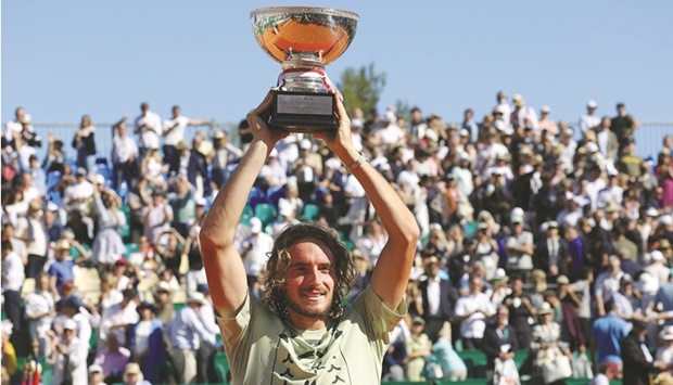 Greeceu2019s Stefanos Tsitsipas celebrates after winning the Monte Carlo ATP Masters Series in Monaco yesterday. (AFP)