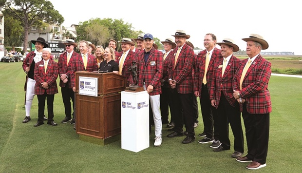 Jordan Spieth is seen with the board members of the Heritage Foundation after winning the RBC Heritage. (USA TODAY Sports)