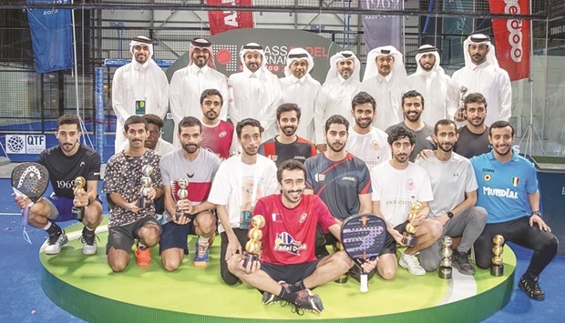 CEO of Qatar Media Corporation HE Sheikh Abdulaziz bin Thani al-Thani and Chief Commercial Officer at Ooredoo Sheikh Nasser bin Hamad bin Nasser al-Thani pose with Jaber al-Mutawa and Mohamed al-Khanji, winners of the Category A at the Al Kass Padel Tournament Ooredoo 2022.