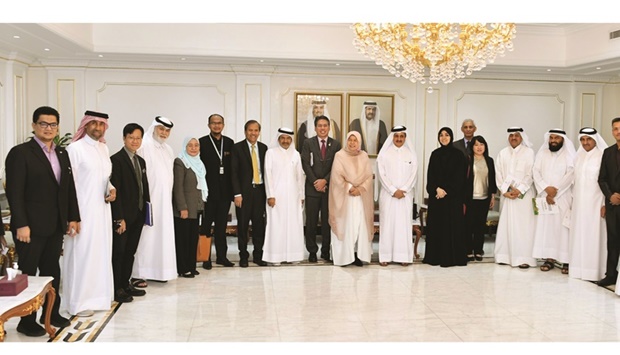 Qatar Chamber Chairman Sheikh Khalifa bin Jassim al-Thani and Malaysian Minister of Plantation Industries and Commodities Zuraida Kamaruddin are joined by other officials and members of the Malaysian delegation during a meeting held on Wednesday in Doha.