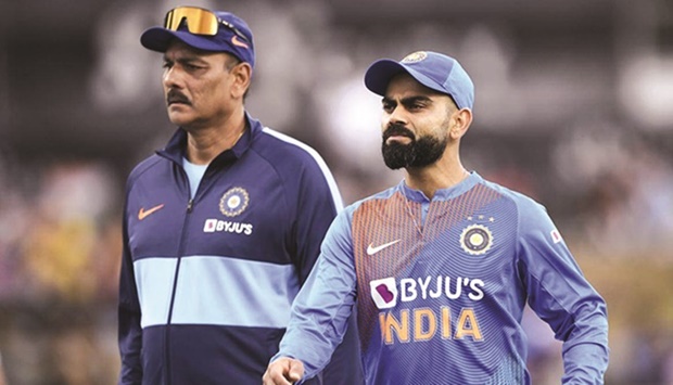 Former Indian captain Virat Kohli is seen with ex-coach Ravi Shastri in this file photo.