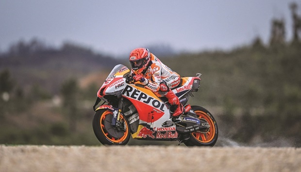 Hondau2019s Spanish rider Marc Marquez takes part in the first practice session of the MotoGP Portuguese GP at the Algarve International Circuit in Portimao yesterday. (AFP)