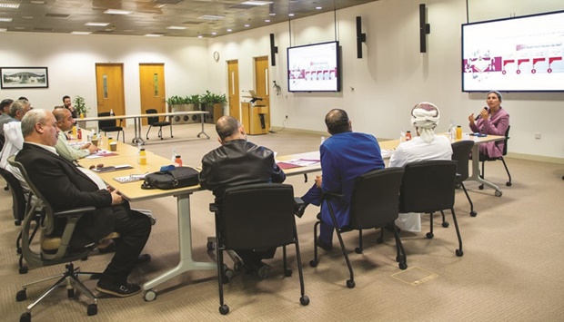 School teachers attend workshop on precision medicine.