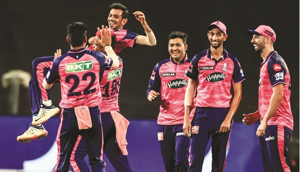 Rajasthan Royals players celebrate the wicket of a Royal Challengers Bangalore batsman during their Indian Premier League match in Pune yesterday. Rajasthan Royals won by 29 runs.