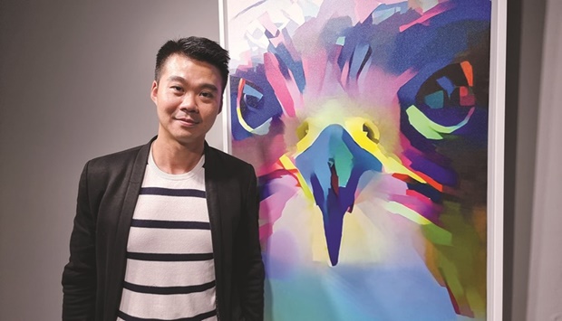 Dr James She showcases his latest artworks at Katara. PICTURE: Joey Aguilar