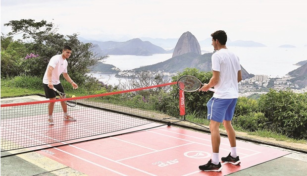 Carlos Alcaraz (left) of Spain is seen during a promotional event at the Rio Open in February this year. Alcaraz, 18, became the youngest to clinch an ATP 500 title when he defeated Diego Schwartzman in the final of the Rio Open.