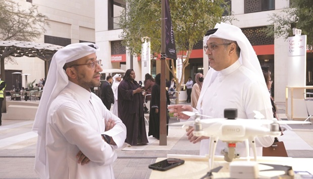 HE Mohamed bin Ali al-Mannai visited Ibtecharu2019s booth, where he was welcomed by Nayef al-Ibrahim.