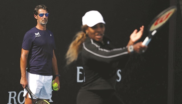 Serena Williams hinted she could return to action at Wimbledon after her long-time coach Patrick Mouratoglou (left) announced he would work with Simona Halep on a full-time basis. (Reuters)