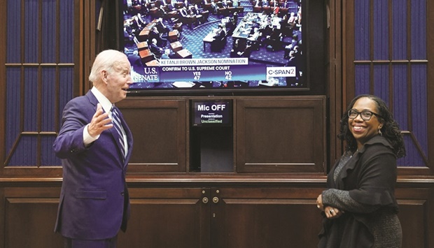 US President Joe Biden congratulates Judge Ketanji Brown Jackson after the Senate voted to confirm her to the US Supreme Court.