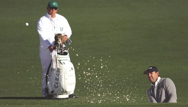 Charl Schwartzel of South Africa plays a shot from the bunker during the second round of The Masters in Augusta, Georgia yesterday. (AFP)