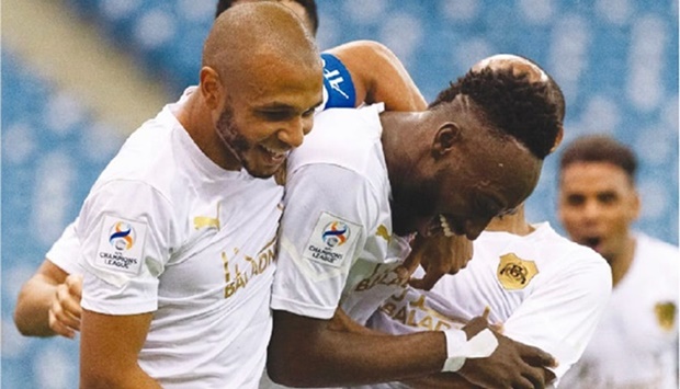 Al Rayyanu2019s Yohan Boli (centre) celebrates with teammates after scoring the winner against FC Istiklol in the AFC Champions League Group A match at King Fahd International Stadium in Riyadh on Friday.
