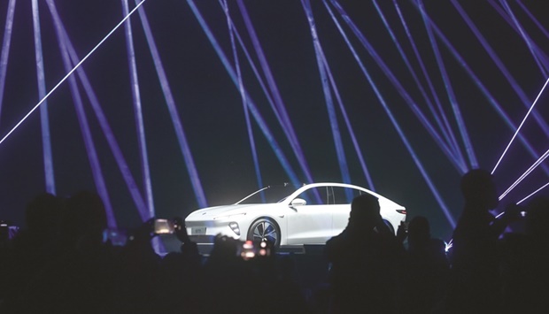 This photo taken on January 9, 2021 shows the NIO ET7, the flagship sedan for the Chinese electric car manufacturer, during its launch ceremony in Chengdu, in Chinau2019s southwest Sichuan province. Taking a look at the geographic breakdown of the vehicles underscores how just a few regions are driving most of the adoption. China accounts for 46% of the total sales to date, followed by Europe at 34%. North America is a distant third at 15%, but fresh policy support should get that EV market moving this year and next. All the remaining countries combined account for just 5% of the global EV fleet.