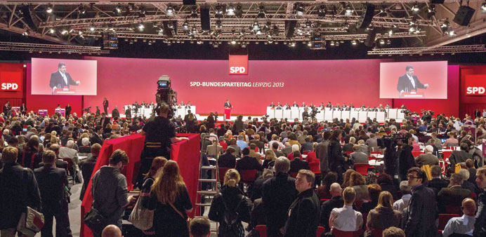 Gabriel speaks on stage during the SPD party congress in Leipzig.