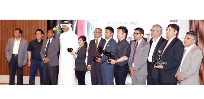 Salam Stores and Canon officials at the launch of the new cameras.