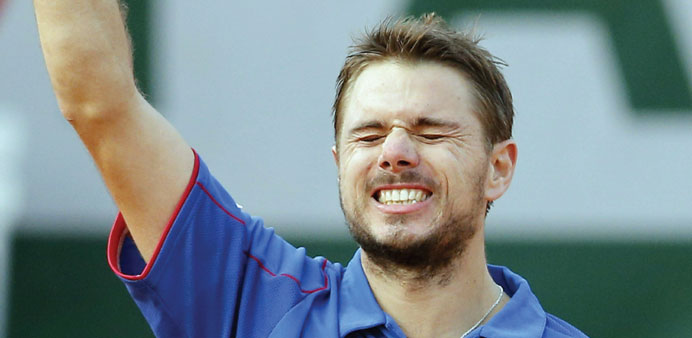 Wawrinka was a relieved man after Pospisil conceded the match due to injury. (AFP)