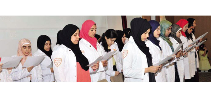 Students taking the Oath of a Pharmacist.