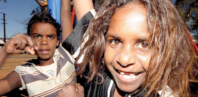  A file picture of Aborigine children in Australia. A new study has turned up evidence of recent inter-breeding between native Australians and people 