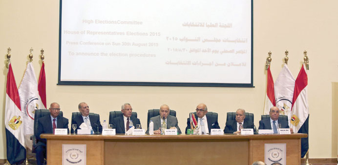  Members of the High Elections Committee hold a news conference in Cairo yesterday.