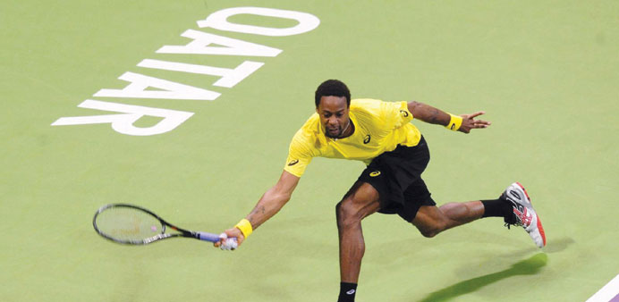 Gael Monfils of France stretches for a forehand en route to his win over Germanyu2019s Florian Mayer in the semi-final of the Qatar ExxonMobil Open yester