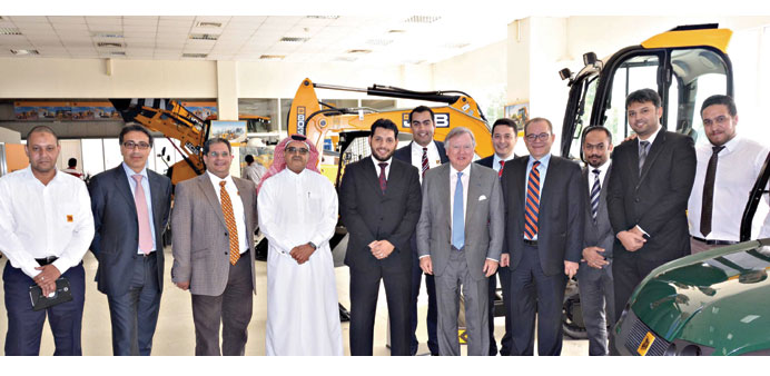 Officials during the visit by Lord Bamford.
