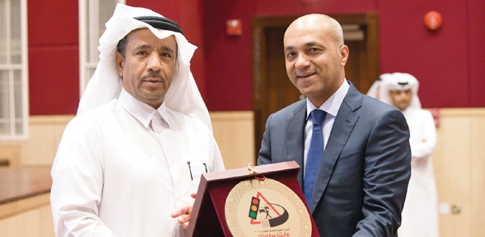 Mohamed Kandeel with Brigadier Mohamed Saad al-Kharji.