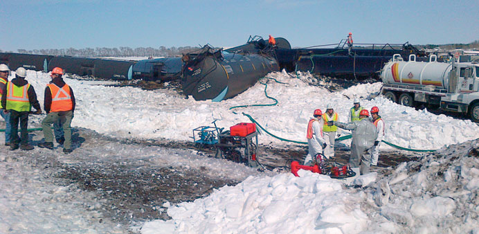 This handout image provided by the Minnesota Pollution Control Agency shows crews working to recover up to 30,000 gallons of crude oil that leaked fro