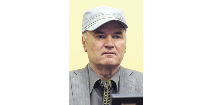    Mladic: was told off by the judge for taking loudly to a witness during a break in the proceedings.