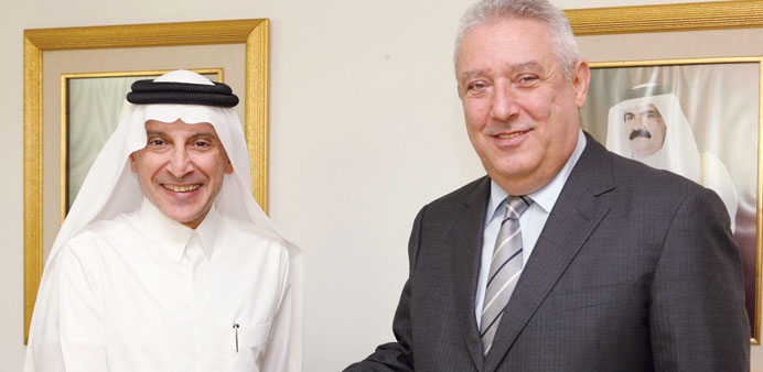 Al-Baker shakes hands with Teffaha.