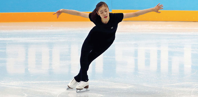 South Koreau2019s Kim Yuna practices her routine during a figure skating training session at the Iceberg Skating Palace training arena yesterday. (Reuters