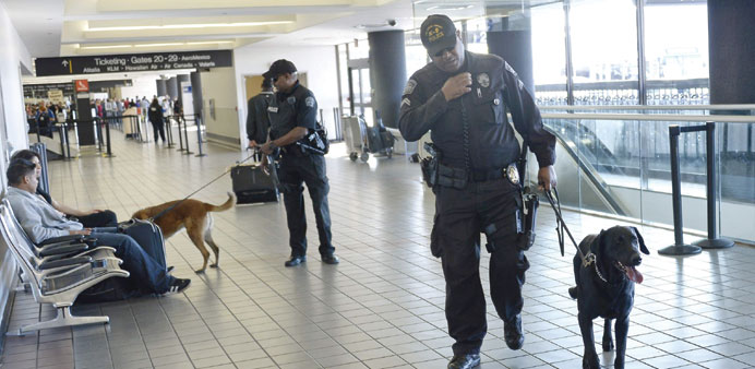 A couple of police officers patrolling the Los Angeles airport yesterday.
