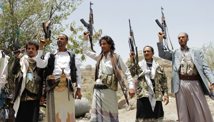 Supporters of the Shia Houthi militia brandish their weapons in Yemen's second largest city of Taiz 