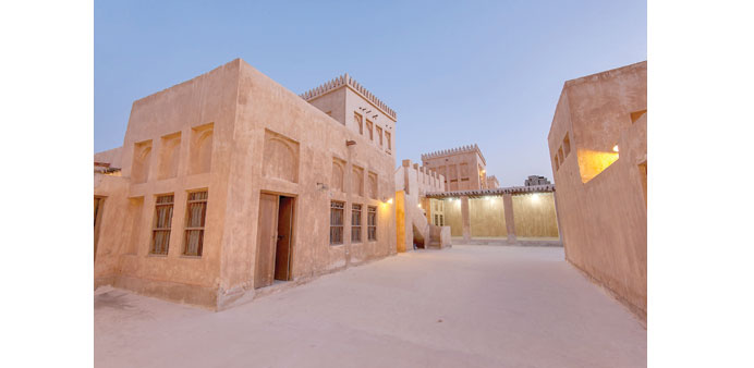 DISTINCTIVE: A backyard in Al Wakrah Souq restored to old glory; below, eateries on the seafront.