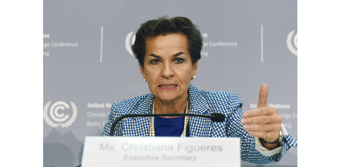 Christiana Figueres, executive secretary of the UN Framework Convention on Climate Change (UNFCCC), addresses a press conference at the UNFCCC summit 