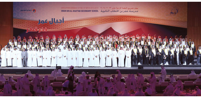Graduates with the guests and school officials.