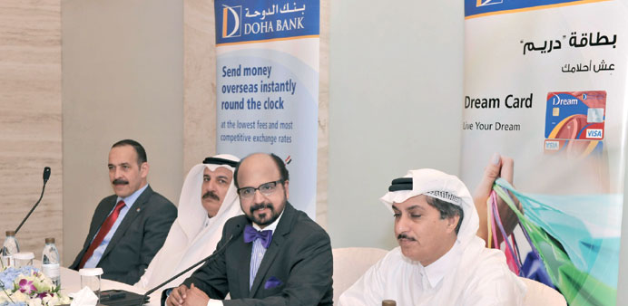    Dr R Seetharaman with other Doha Bank executives at the media event on the sidelines of a seminar in Dubai yesterday.