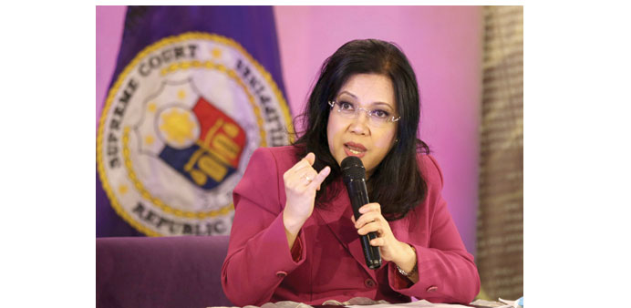 Chief justice Maria Lourdes Sereno speaks to media during a press conference in Manila yesterday.