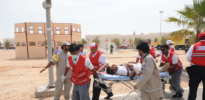 An u2018injured manu2019 being evacuated by QRC personnel during the demo.