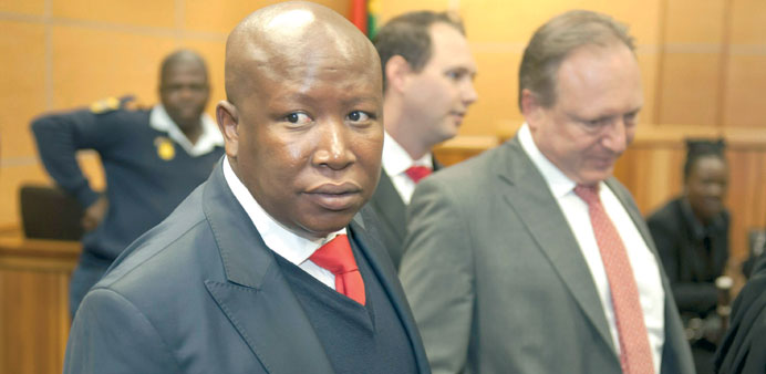 Expelled ANC Youth League president Julius Malema arrives at the Limpopo High Court in Polokwane yesterday to face charges of fraud, corruption, money