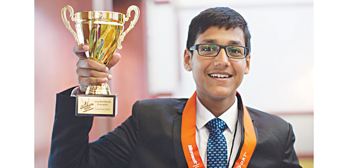 Kansal proudly shows his trophy after winning the championship.