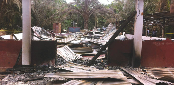The debris of a burnt Christian church is seen in Aceh Singkil district yesterday, a day after a man was killed in violent clashes that saw a church b