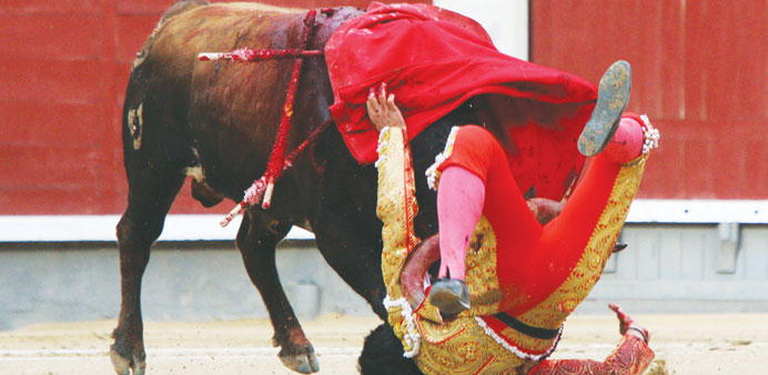 Spanish matador Jimenez Fortes is gored by Feten at the Las Ventas bullring in Madrid on Tuesday.