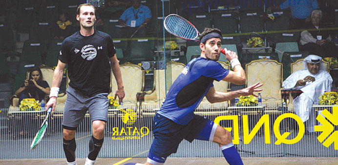 Spainu2019s Borja Golan (right) plays a shot against Franceu2019s Gregory Gaultier during their Qatar Classic Squash match here yesterday. 