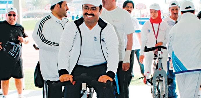 Industry and Energy Minister HE Mohamed bin Saleh al-Sada pitched in to make the National Sport Day a success.
